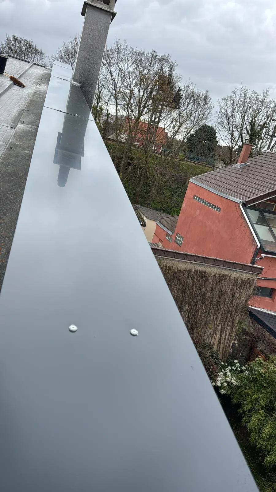 Acrotère habillé de zinc avec couvertine posée à Houilles (78) (après travaux)